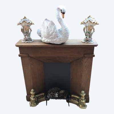 Small decorative solid wood mantel from the late 19th century