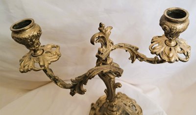 Pair of double candlesticks in chased and gilded bronze with Louis XV style decorations