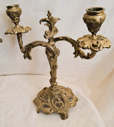 Pair of double candlesticks in chased and gilded bronze with Louis XV style decorations