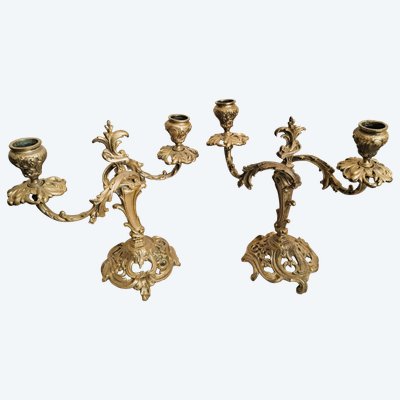 Pair of double candlesticks in chased and gilded bronze with Louis XV style decorations