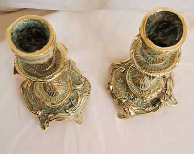 Pair of chased and gilt bronze candlesticks in the Louis XV style, early 20th century