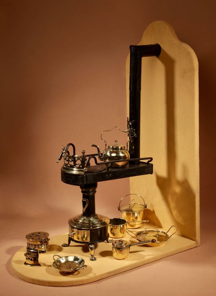 Unusual model of a Continental flat-bottomed stove, circa 1880/1900