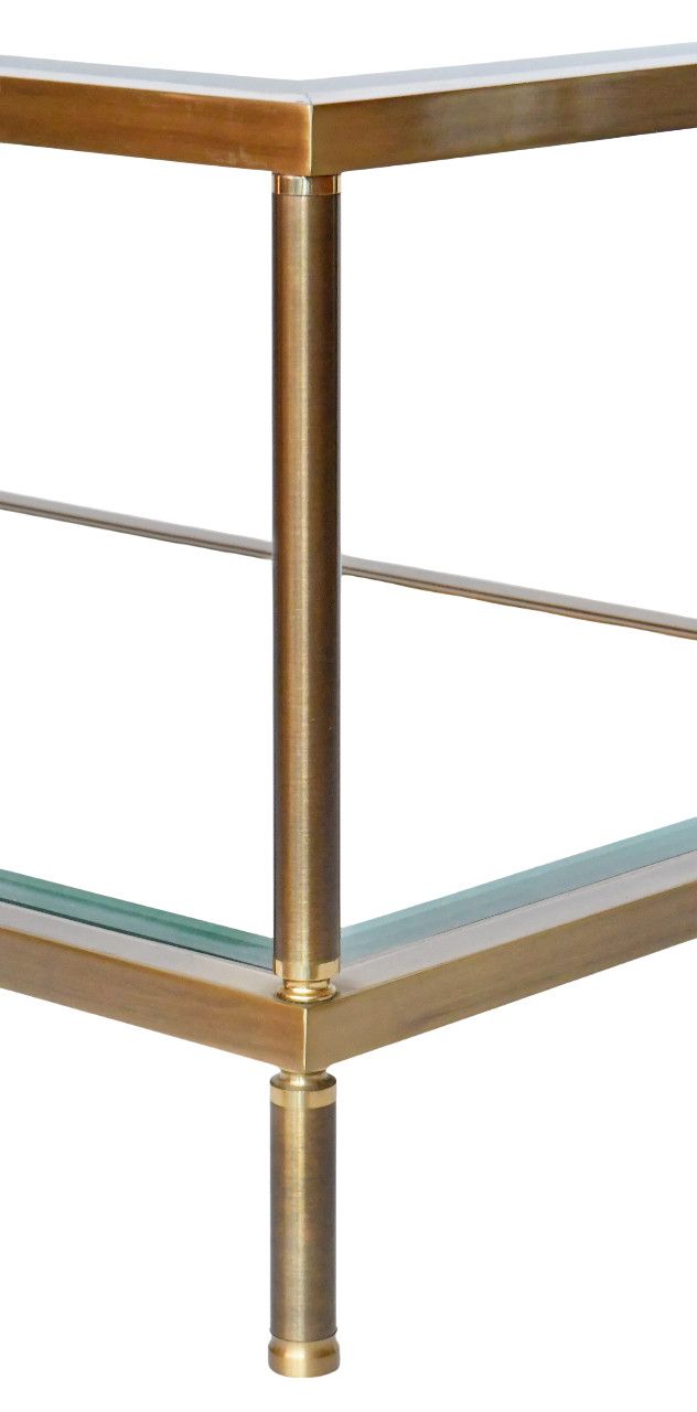 Table basse en laiton doré et deux plateaux en verre biseauté  