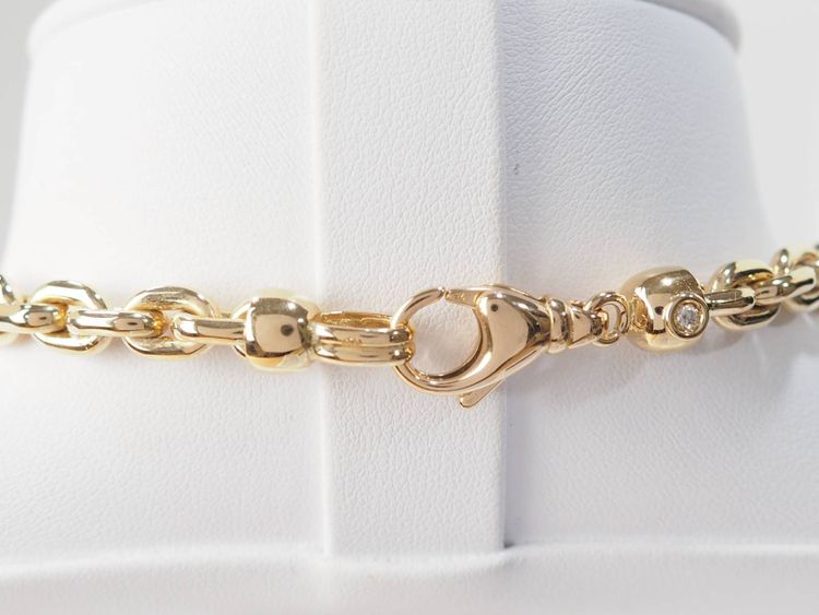 Collier maille forcat limée en chute en or jaune et diamant