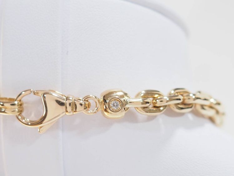 Collier maille forcat limée en chute en or jaune et diamant