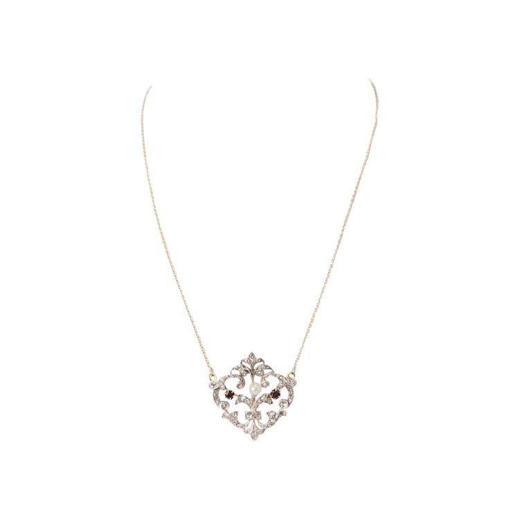 Collier volutes en or jaune et argent, grenat diamants et perle