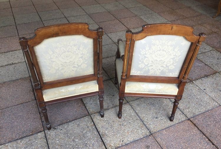 Pair of Louis XVI armchairs with flat backs.