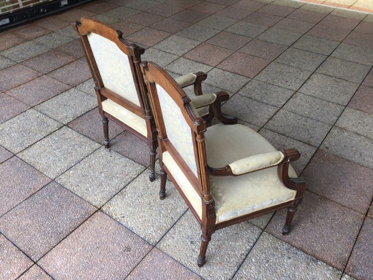 Pair of Louis XVI armchairs with flat backs.