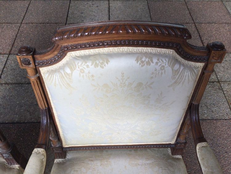 Pair of Louis XVI armchairs with flat backs.