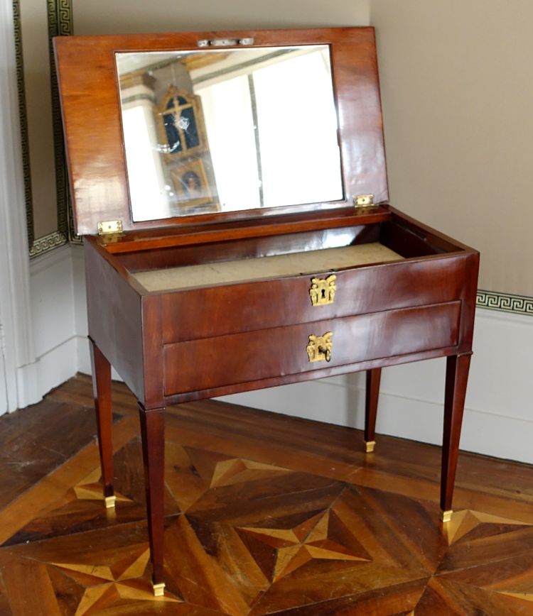 Empire period mahogany dressing table with sliding top