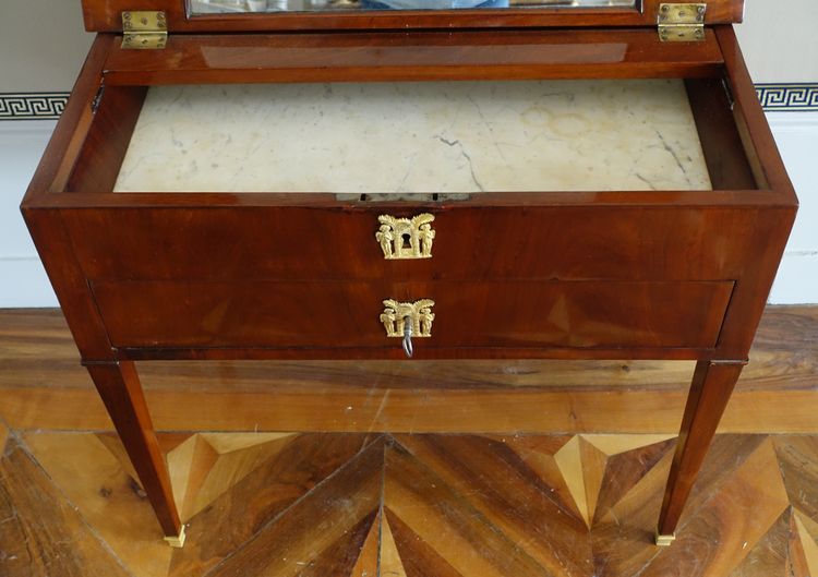 Empire period mahogany dressing table with sliding top