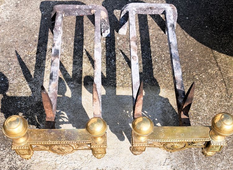 Pair of Louis XVI bronze and iron candlesticks, 19th century