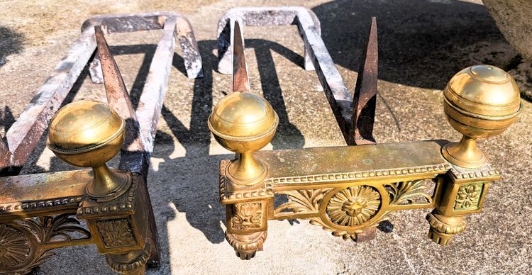 Pair of Louis XVI bronze and iron candlesticks, 19th century