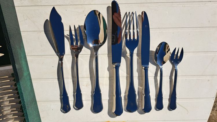 Antique 100-piece monogram cutlery set (18.8) France Inox