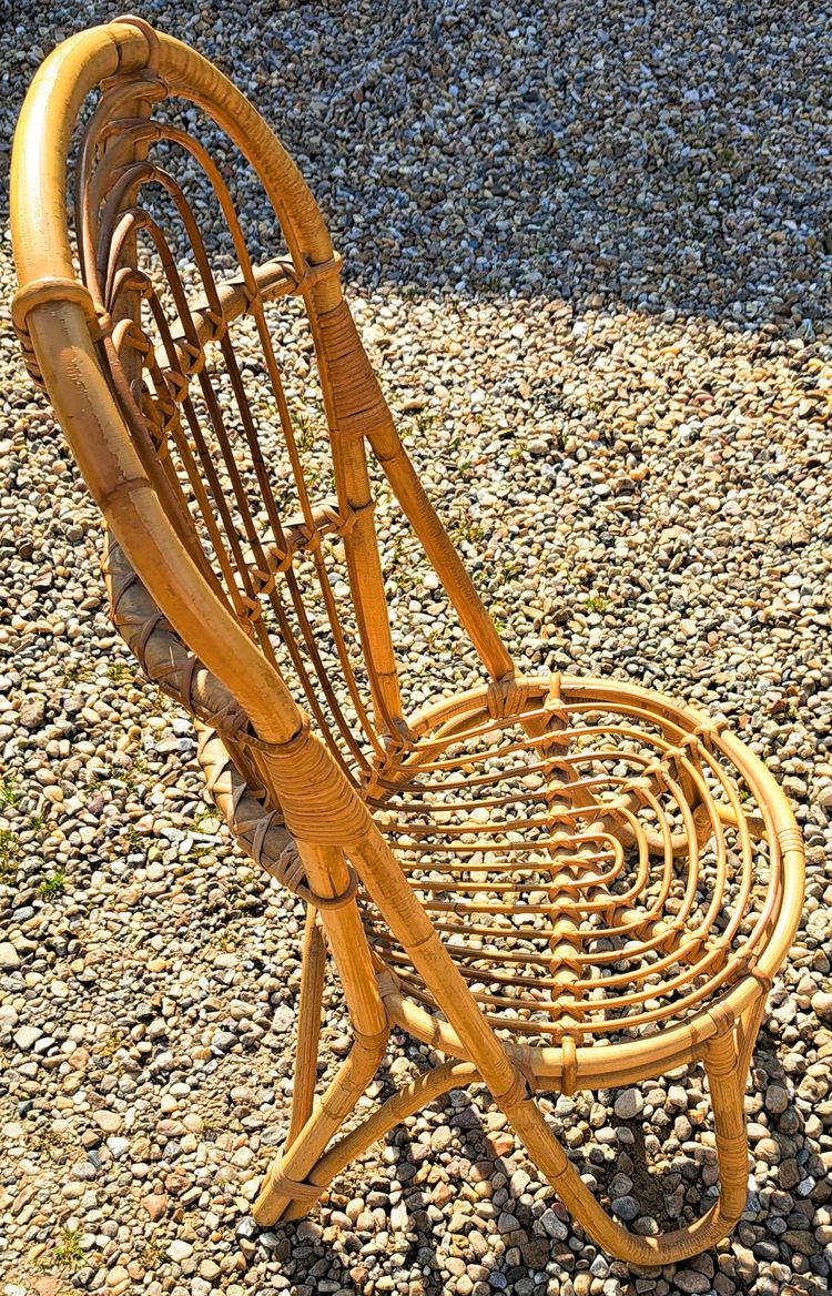 Rattan chair with rounded back from the 60s and 70s