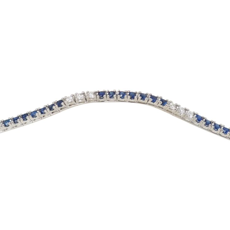 Bracciale fiume in oro bianco, zaffiri e diamanti