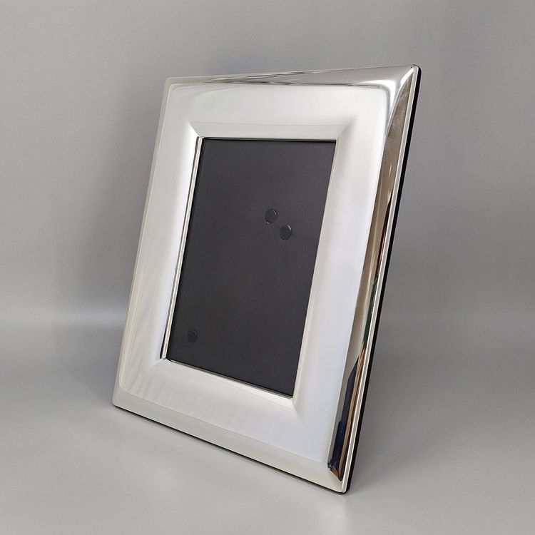 Superbe cadre photo des années 1970 en plaqué argent et verre. Fabriqué en Italie.