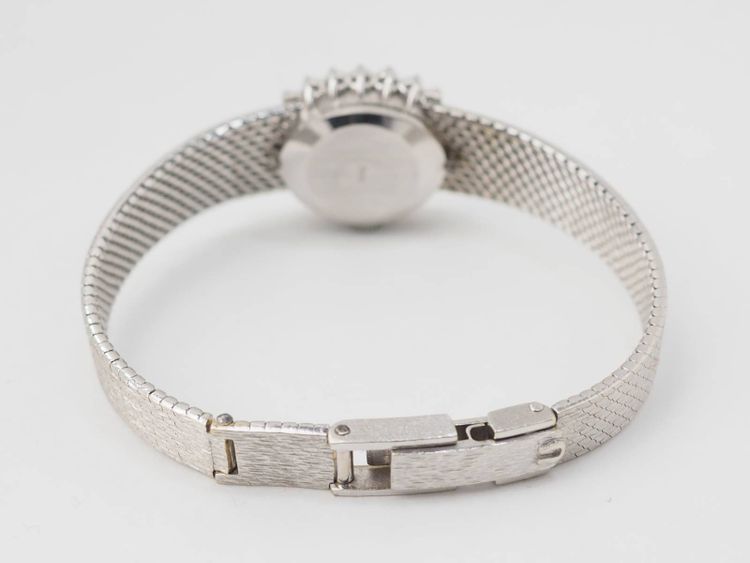 Montre Omega en or blanc et diamants