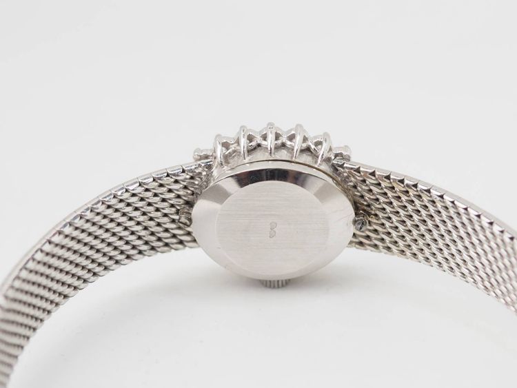 Montre Omega en or blanc et diamants