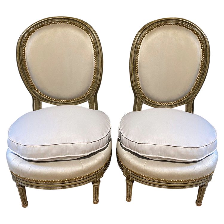 Pair of Louis XVI style armchairs with medallion backs, circa 1900