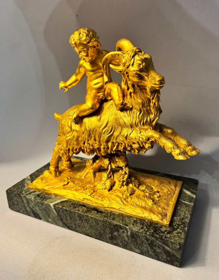 Sculpture en bronze doré Bacchus ou putto sur un bouc XIXè