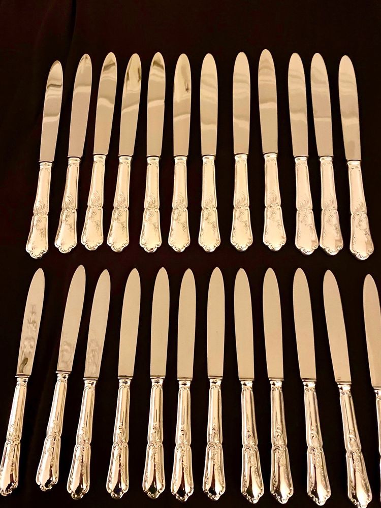 24 silver-plated knives