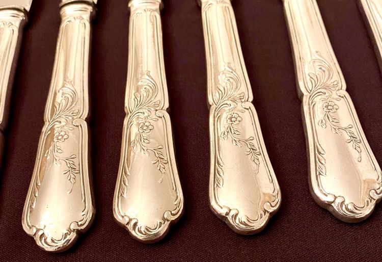 24 silver-plated knives