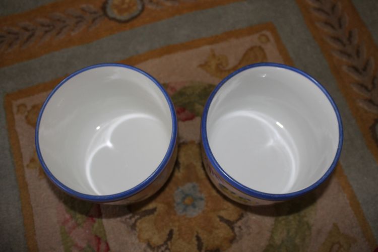 Pair of hand-painted Paris porcelain pot holders from the Louis Philippe period