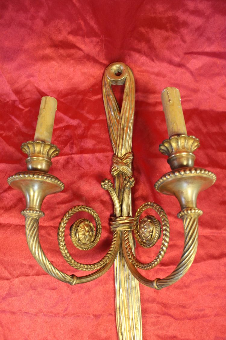 Pair of large bronze sconces with passementerie decoration in the 19th century Louis XVI style h: 60 cm