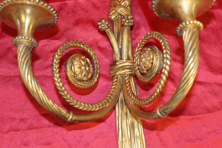 Pair of large bronze sconces with passementerie decoration in the 19th century Louis XVI style h: 60 cm
