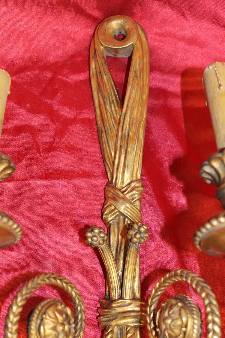Pair of large bronze sconces with passementerie decoration in the 19th century Louis XVI style h: 60 cm