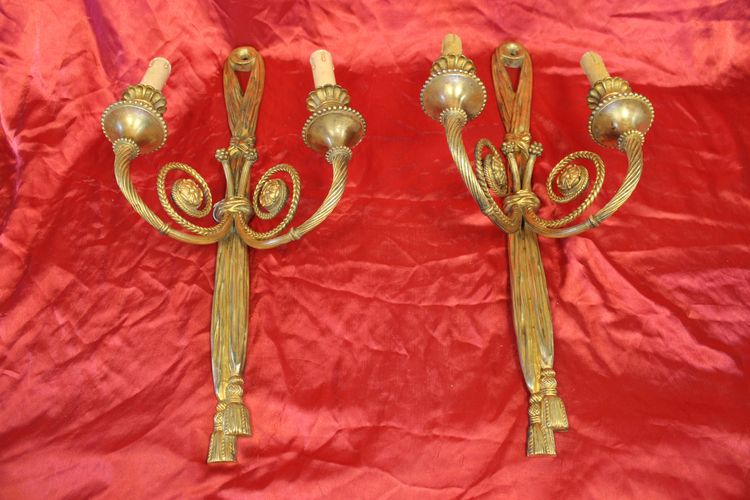 Pair of large bronze sconces with passementerie decoration in the 19th century Louis XVI style h: 60 cm