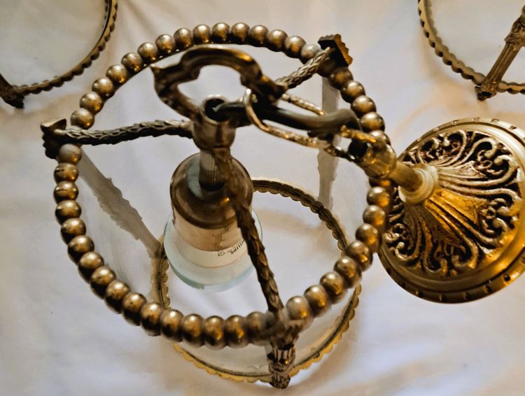 Suite de trois lanternes en bronze et verre de style louis XVI