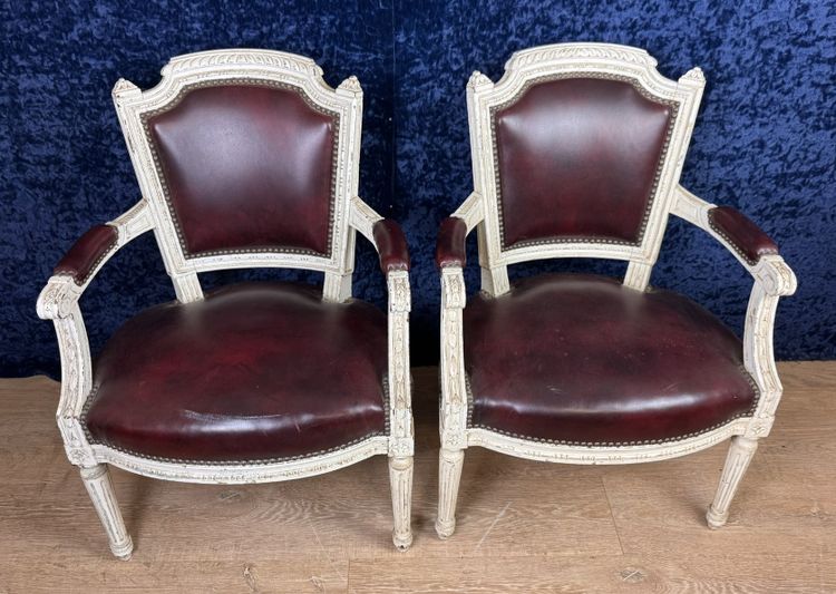 Pair of Louis XVI cabriolet armchairs in lacquered wood and leather circa 1850