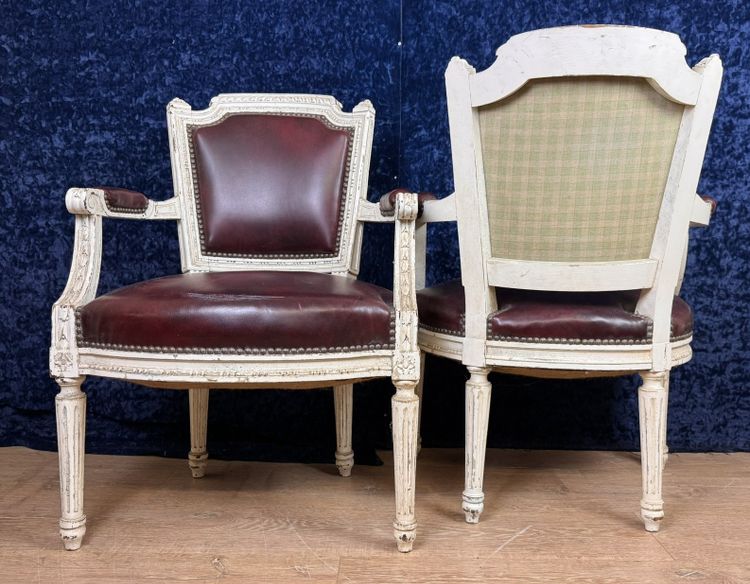 Pair of Louis XVI cabriolet armchairs in lacquered wood and leather circa 1850