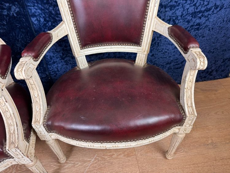 Pair of Louis XVI cabriolet armchairs in lacquered wood and leather circa 1850