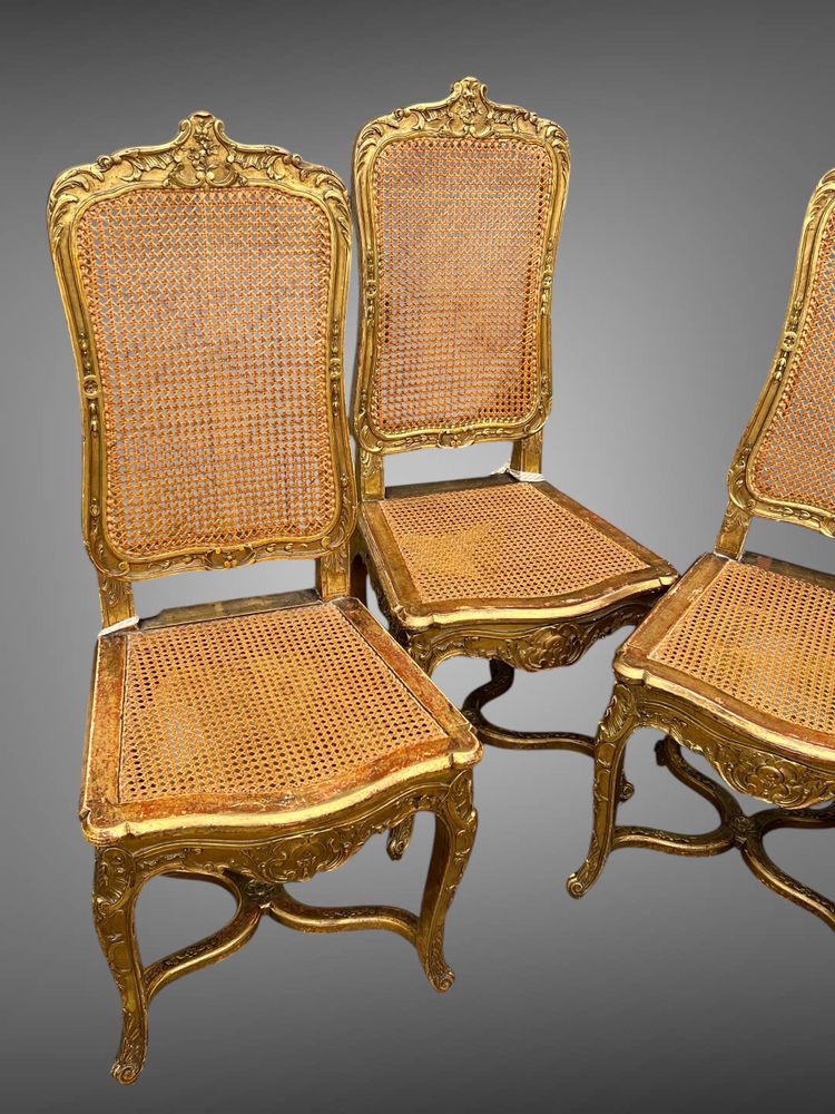 SÉRIE DE 4 CHAISES CANNÉES EN BOIS SCULPTÉ ET DORÉ DE STYLE LOUIS XV ÉPOQUE XIXe
