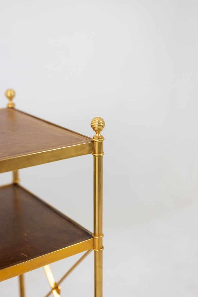Casa Jansen. Console in ottone dorato e pelle fulva. Circa 1970.  LS64292509I