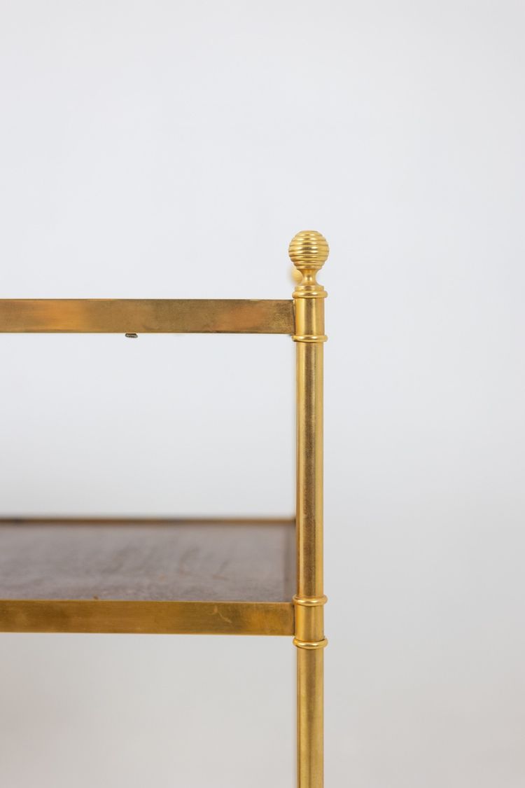 Casa Jansen. Console in ottone dorato e pelle fulva. Circa 1970.  LS64292509I