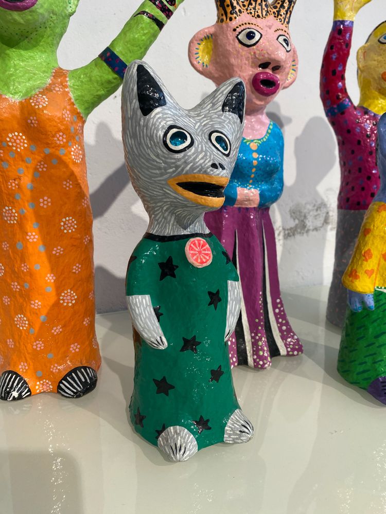 Papier-mâché sculptures "La petite famille" signed by artist Wabé and dated 2003