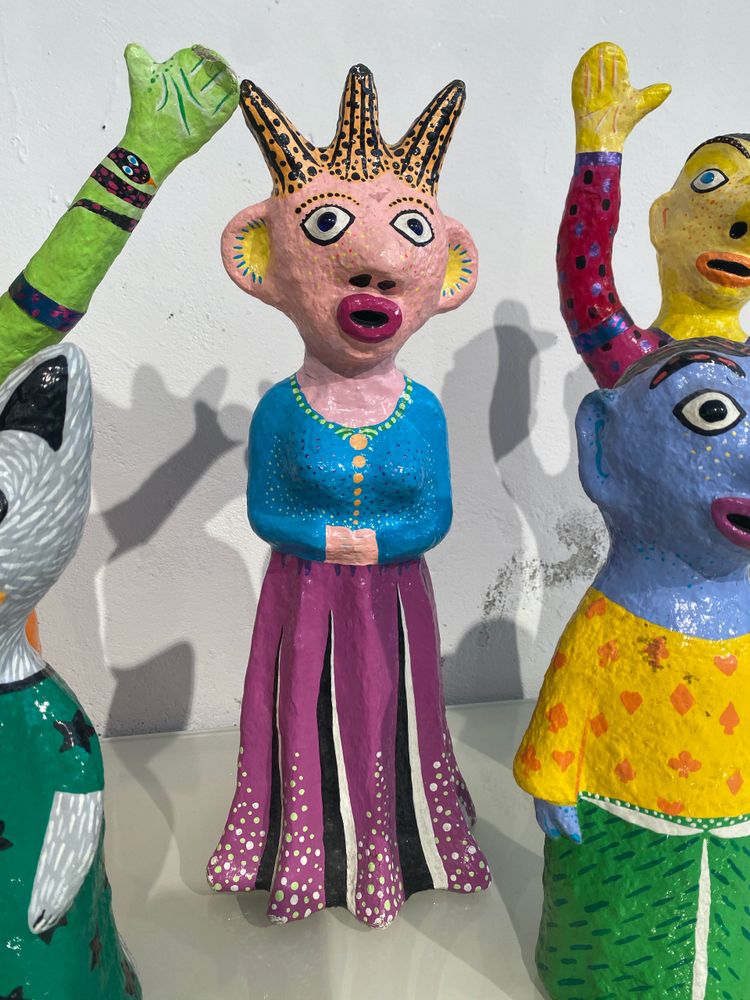 Papier-mâché sculptures "La petite famille" signed by artist Wabé and dated 2003