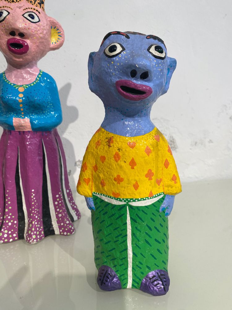 Papier-mâché sculptures "La petite famille" signed by artist Wabé and dated 2003