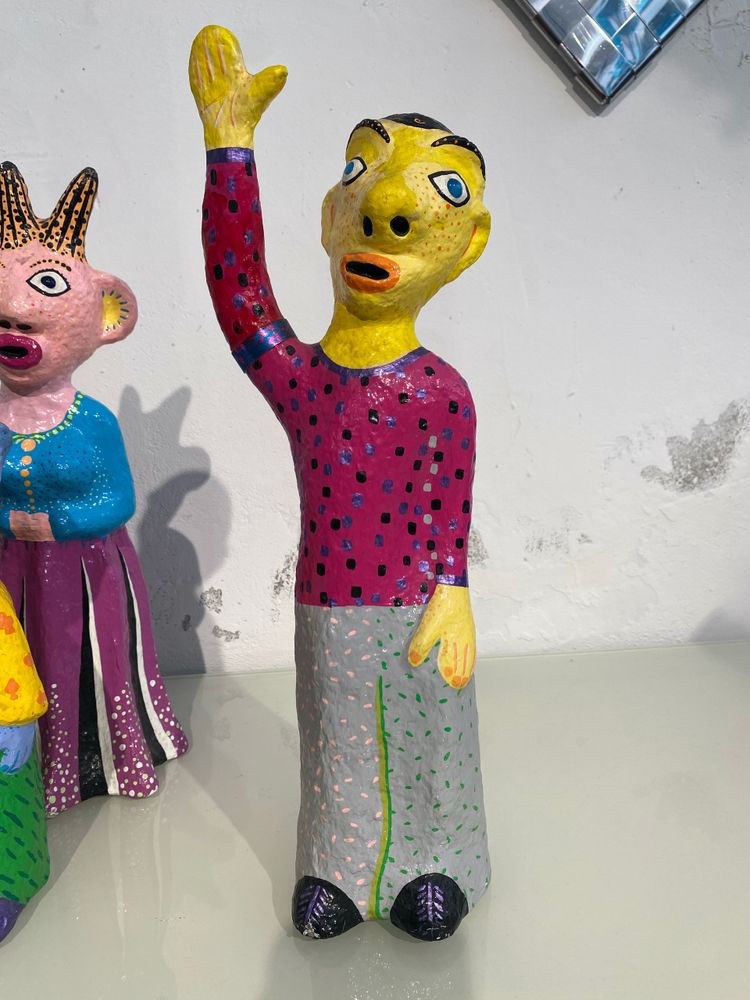 Papier-mâché sculptures "La petite famille" signed by artist Wabé and dated 2003