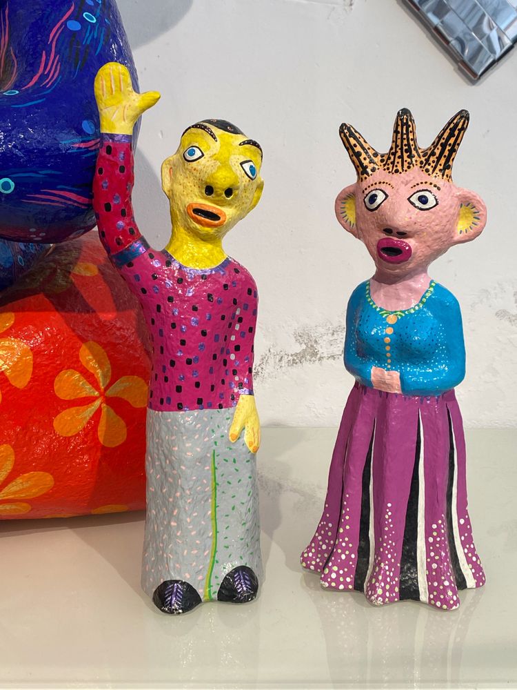 Papier-mâché sculptures "La petite famille" signed by artist Wabé and dated 2003