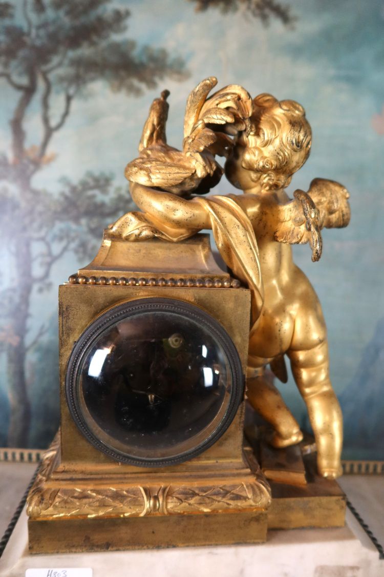Gilt bronze clock "l'angelot au coq" Louis XVI style, 19th century