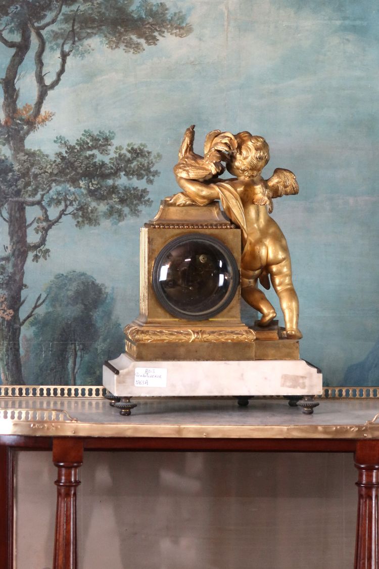 Gilt bronze clock "l'angelot au coq" Louis XVI style, 19th century