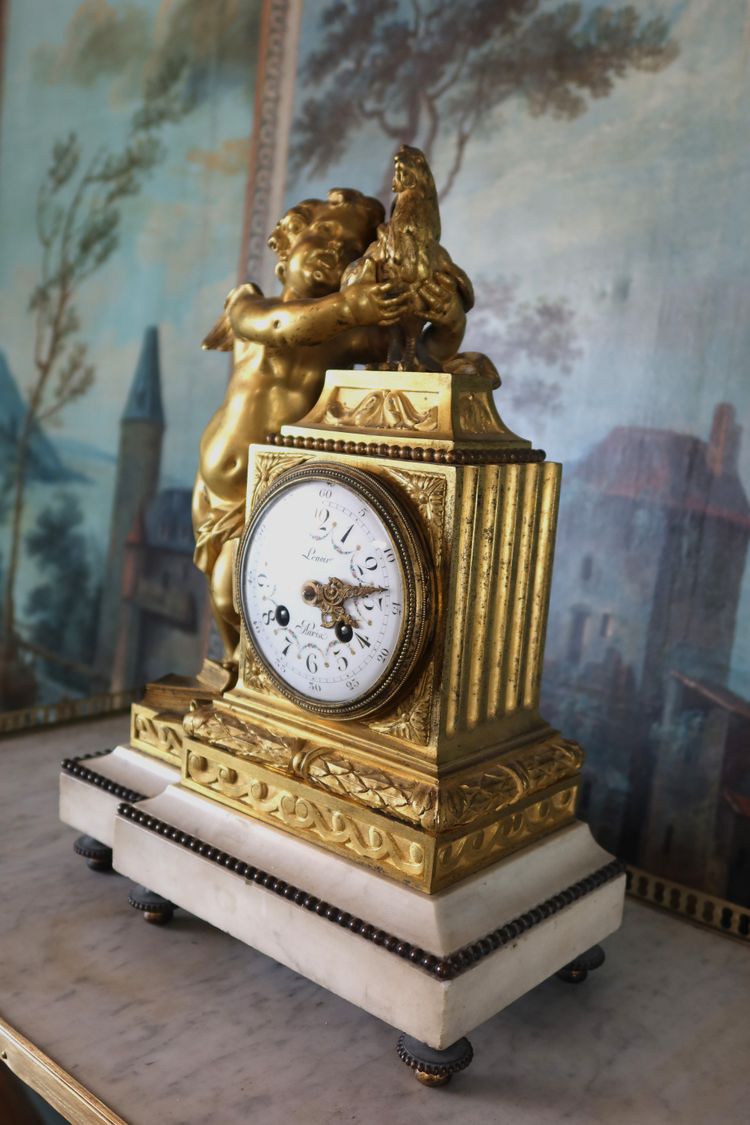 Gilt bronze clock "l'angelot au coq" Louis XVI style, 19th century