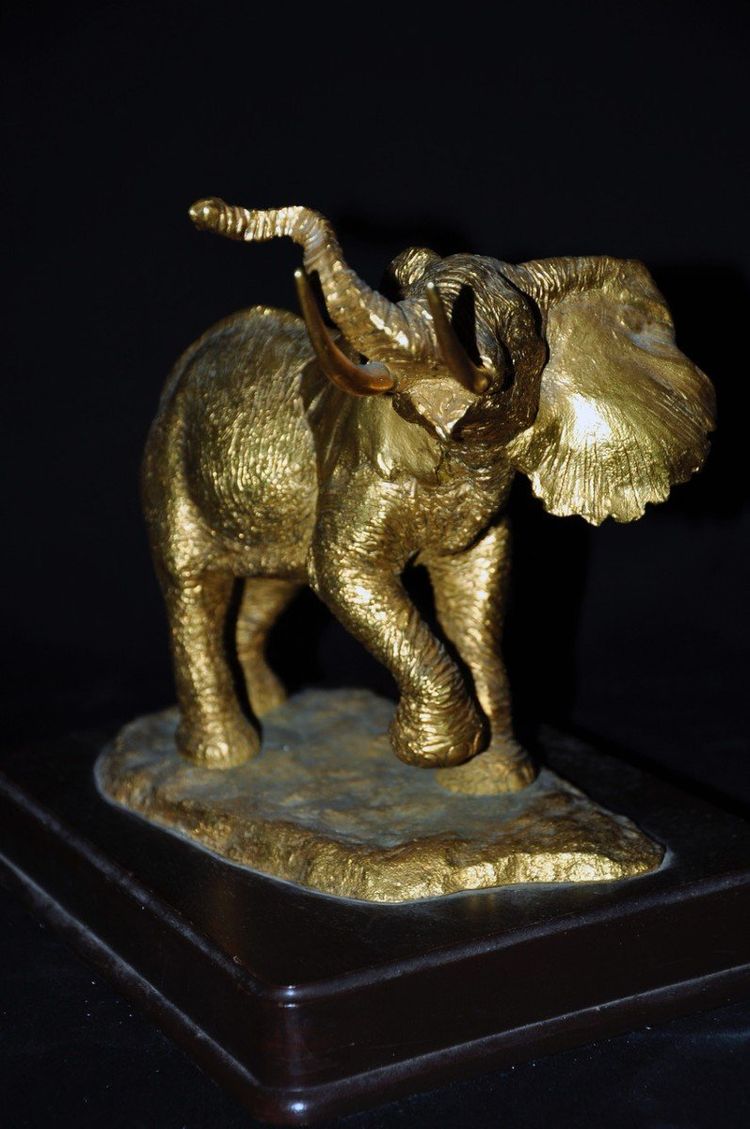 Bronze elephant on wooden base 20th century signed