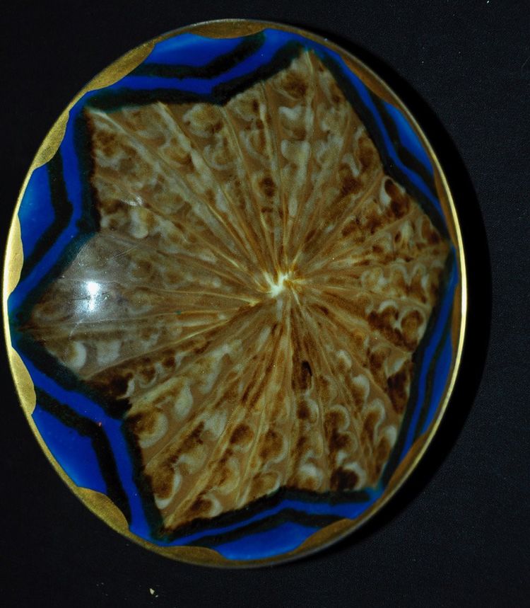 Assiette céramique signée Tharaud Limoges XXe siècle