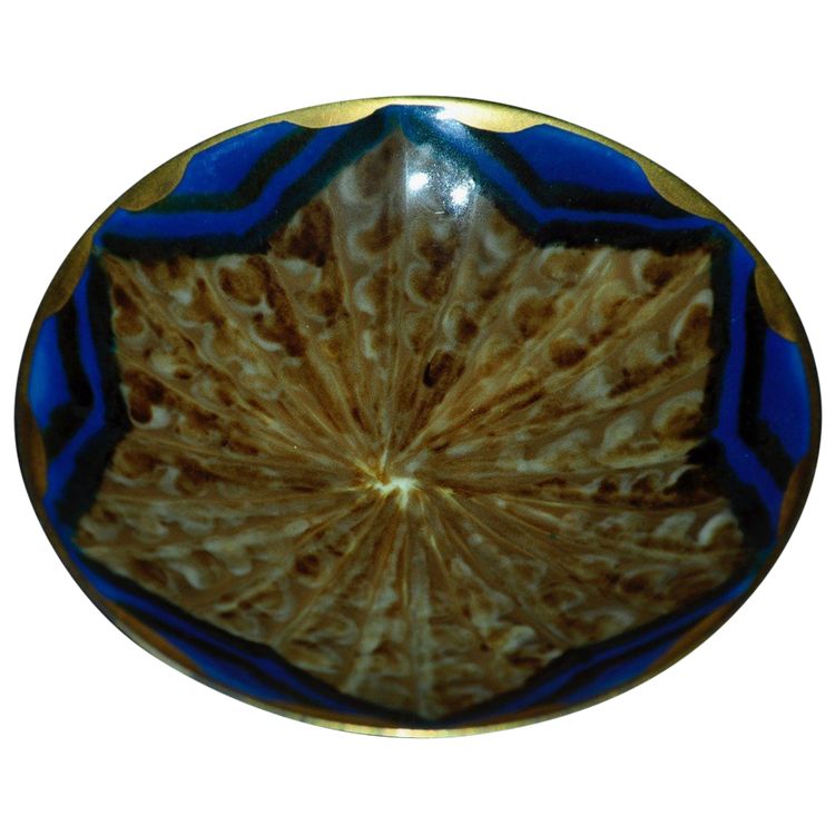 Assiette céramique signée Tharaud Limoges XXe siècle